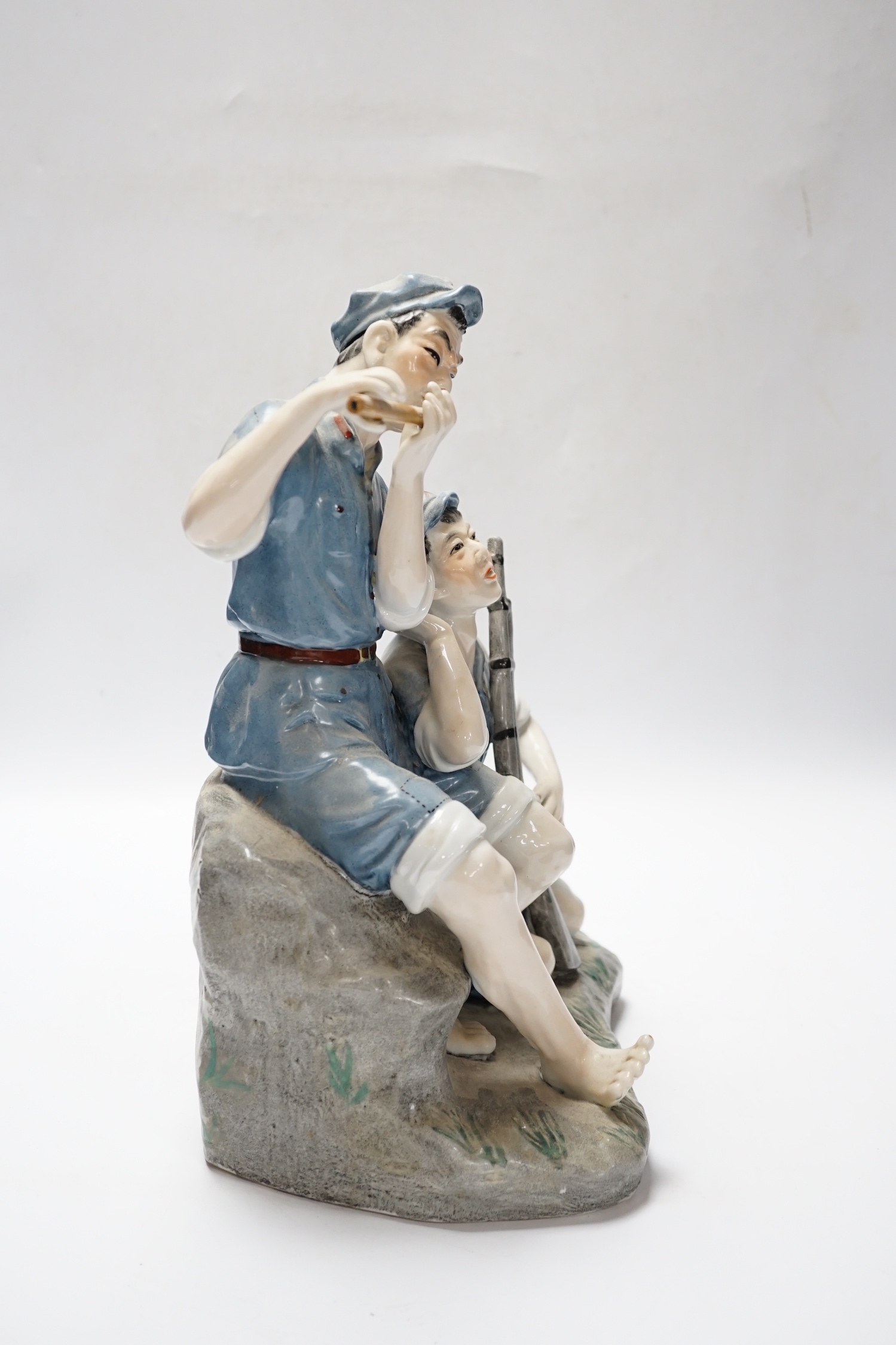 A Chinese Cultural revolution figure group, communist soldiers, 32cm high